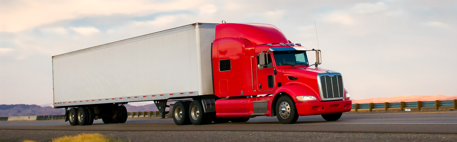 red truck on the road